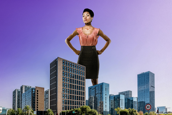 Giant women towering over city